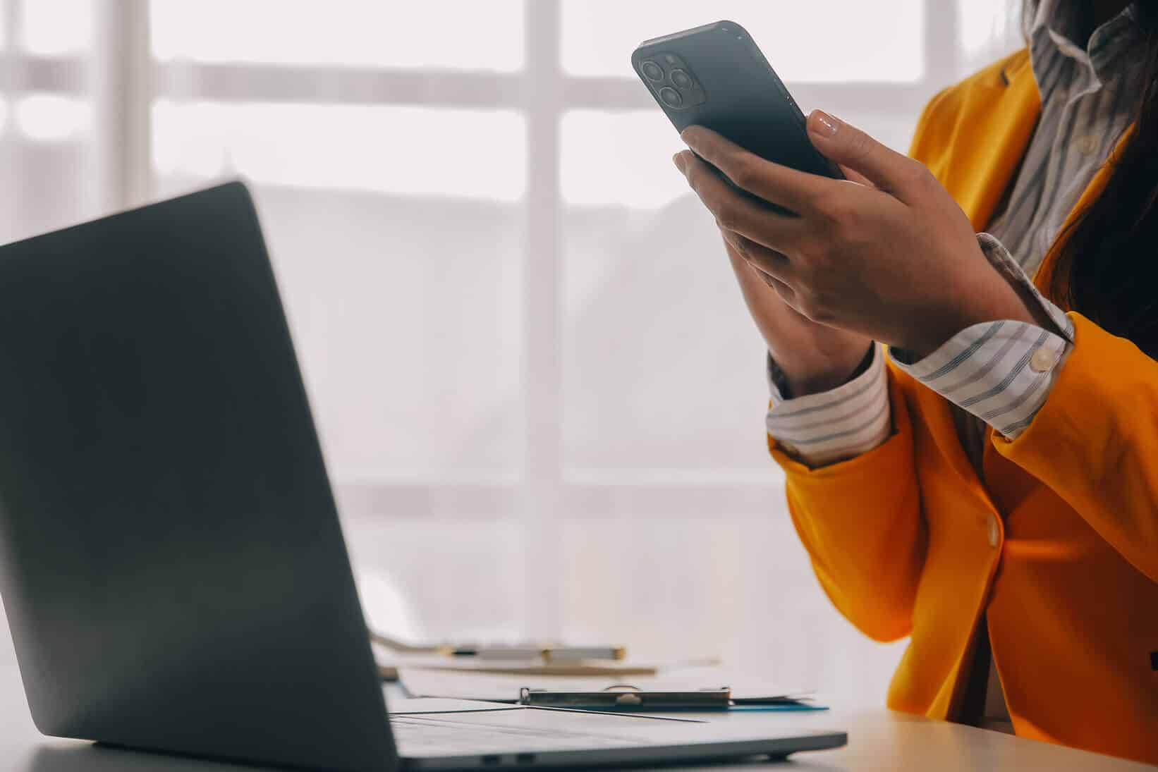 woman holding a smart phone