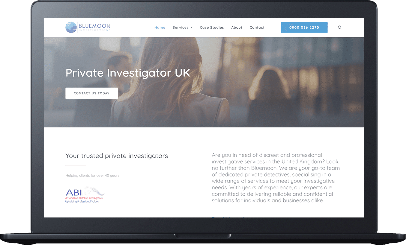 A laptop screen displaying a website for Blue Moon Investigations, a private investigator service in the UK. The page features a