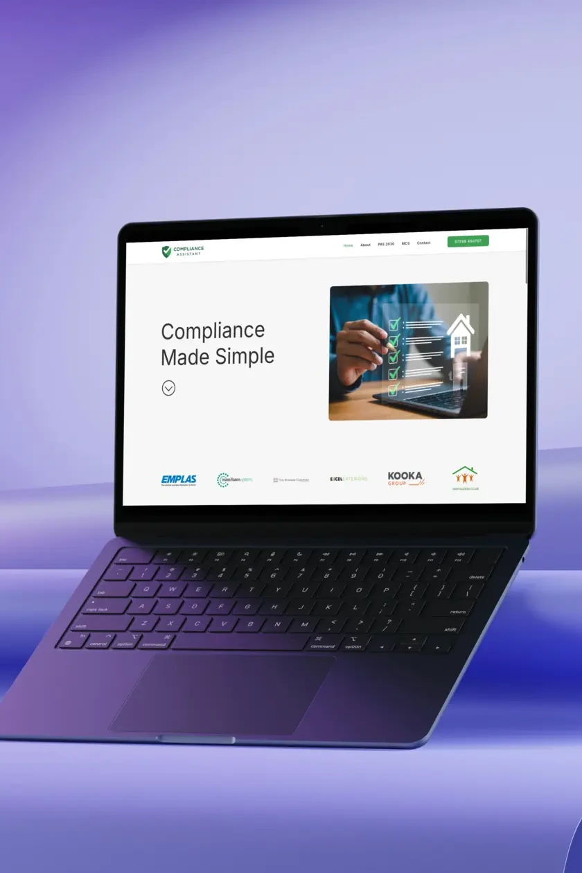 A laptop displaying a website with the headline